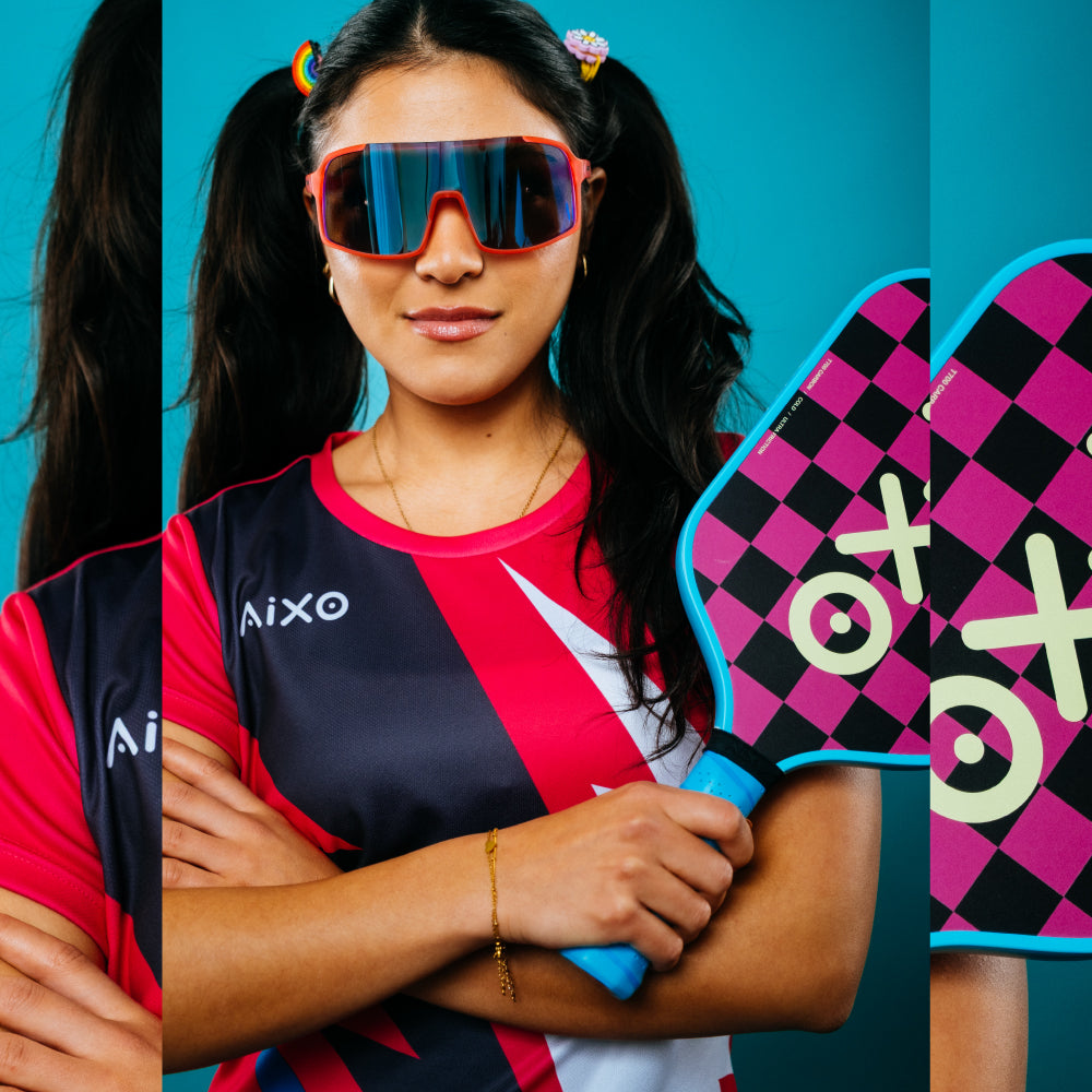 Player holding AIXO Ghost Dogtown pickleball paddle — retro style with street-inspired confidence.