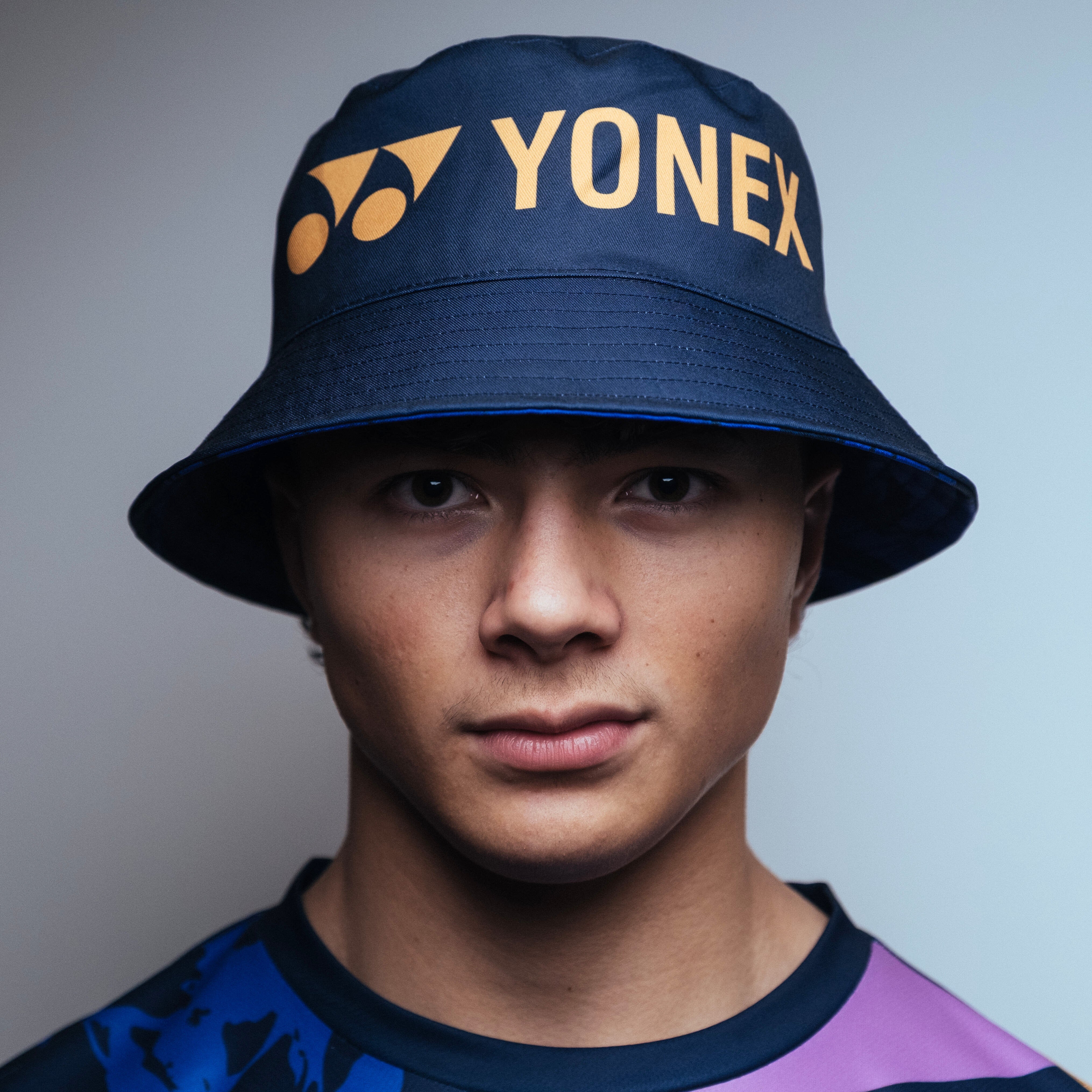 Pre-Order Yonex Legend’s Crown – Reversible Bucket Hat (Ink Blue | Celestial Purple / Pale Gold) Yonex CNY2026 Reversible Bucket Hat A Unisex Clothing Yonex